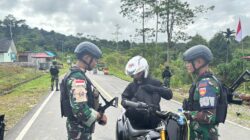 Ciptakan Stabilitas Keamanan Satgas Yonif 410/Alugoro Pos Kout Gelar Pemeriksaan di Jalan Lintas Trans Papua