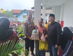 Bripka S. Hamdi Laksanakan Pengamanan Penyaluran Bantuan Beras dan Daging dari Pemprov Banten di Desa Cikupa