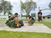 Perakitan dan Pemasangan Lampu Lapangan Voli Makodim