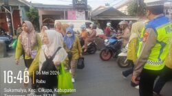Brigadir Rustam Hakim Aktif Laksanakan Pengaturan Lalu Lintas Sore Hari di Cikupa