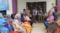 Bhabinkamtibmas Polsek Cikupa Amankan Penyaluran Bantuan Pangan Kemensos di Desa Bitung Jaya