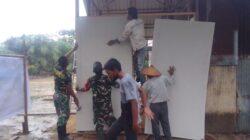 Pengerjaan RTLH di Desa Badak Mekar Terus Berlanjut, Satgas TMMD Ke-128 Kodim 0908/Bontang Lakukan Pemasangan Dinding