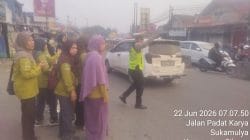 AIPTU Sapudin Laksanakan Pengaturan Lalu Lintas Pagi, Wujudkan Kamseltibcar Lantas di Jalur Columbus Cikupa