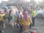 Personel Lantas Polsek Cikupa Laksanakan PECAK Pagi, Wujudkan Kamseltibcar di Simpang Columbus PT Cingluh