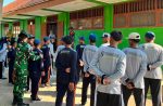 Satgas TMMD 129 Bojonegoro Tanamkan Disiplin, Cinta Tanah Air Melalui Pelatihan PBB Siswa SMP Satu Atap Kesongo