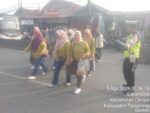 Personel Lantas Polsek Cikupa Laksanakan PECAK Pagi, Pastikan Arus Lalu Lintas Lancar di Pertigaan Columbus PT Cingluh