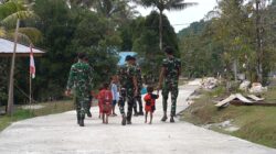 Senyum Anak-Anak Warnai Hasil Pembangunan Jalan Cor 250 Meter TMMD Ke-129 di Kampung Sesor